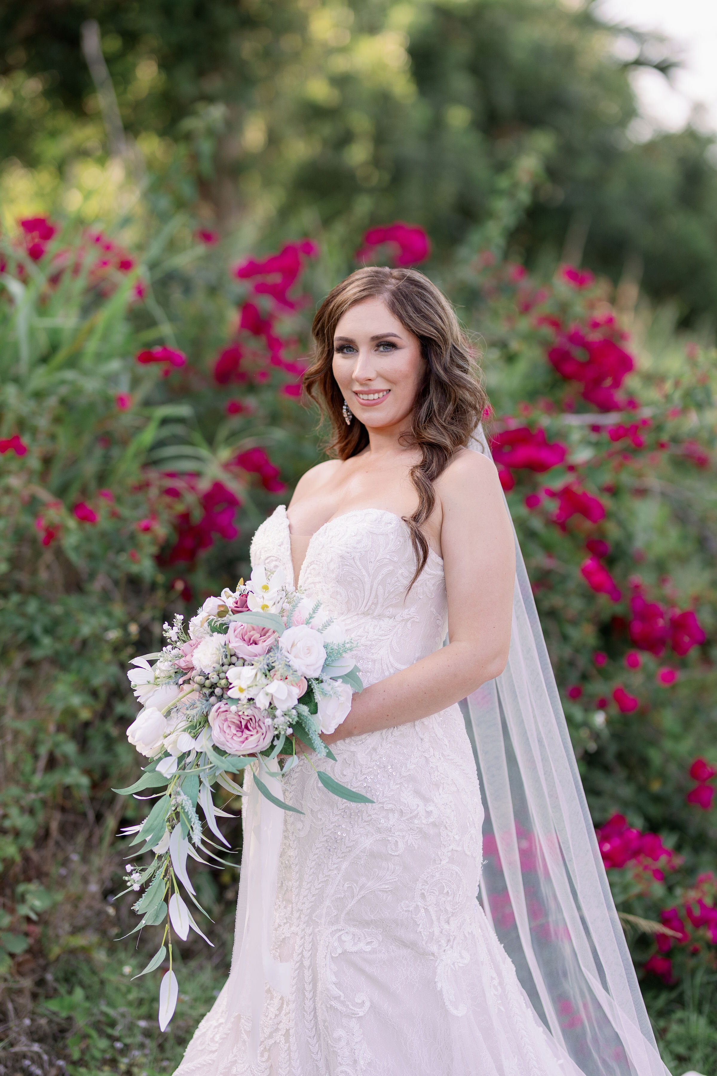 bride with bouquet and cathedral veil.jpg