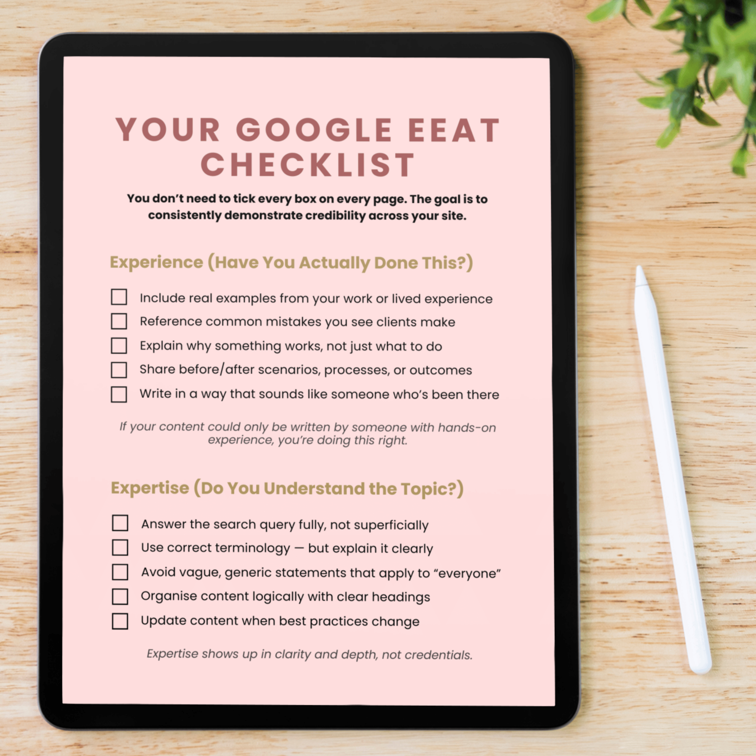 iPad with Google EEAT checklist from the website optimisation guide
