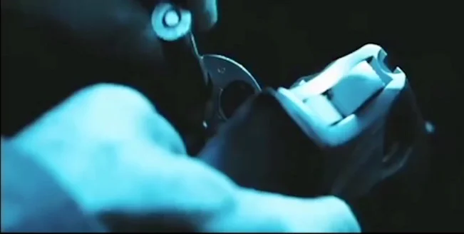 bullet in gun still.jpeg