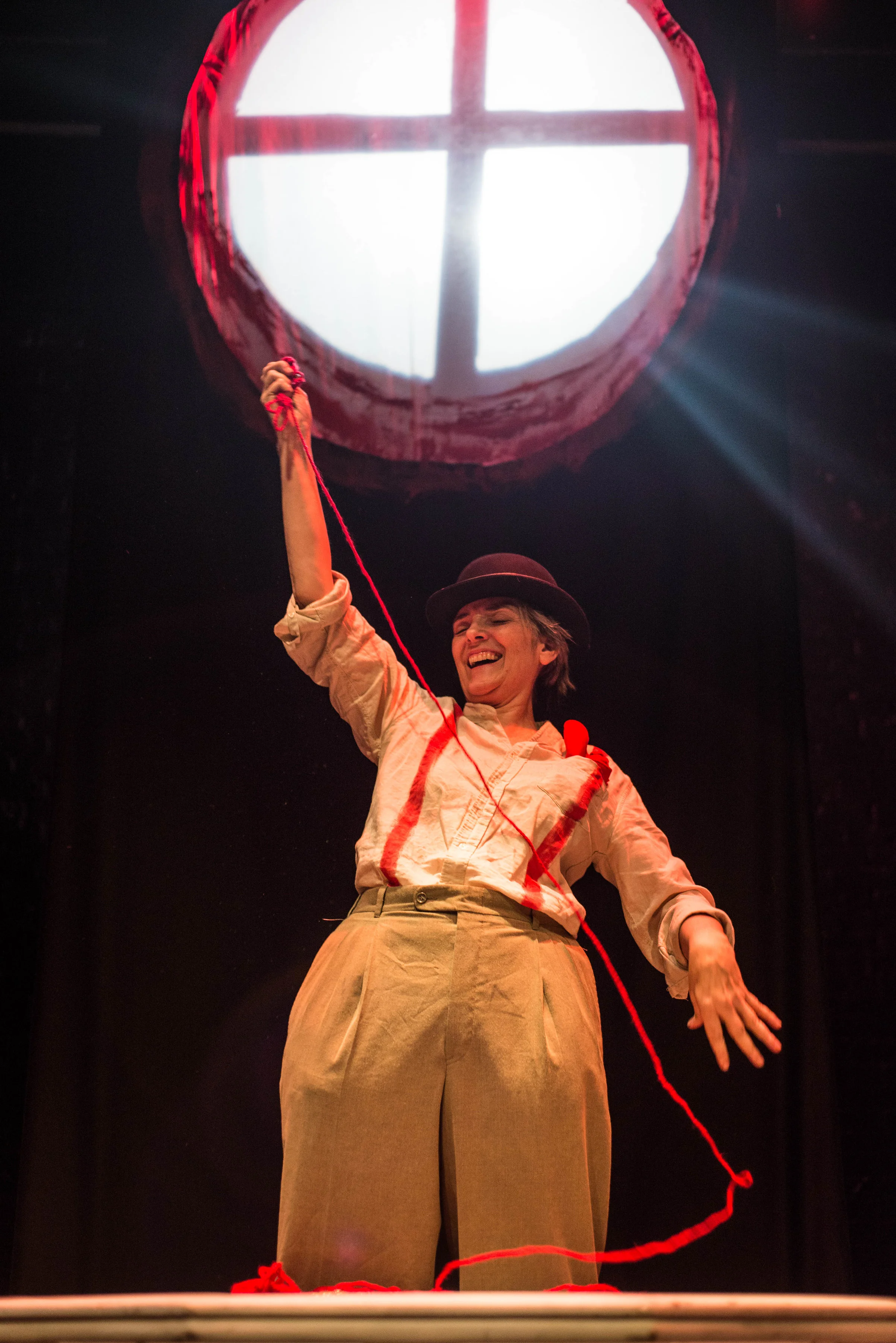 Denise Norman as "Dr. Henry Howard Holmes." (Photo by Sam Gaetz) Scenography: Christine Urquhart. Lighting: Lin Mei