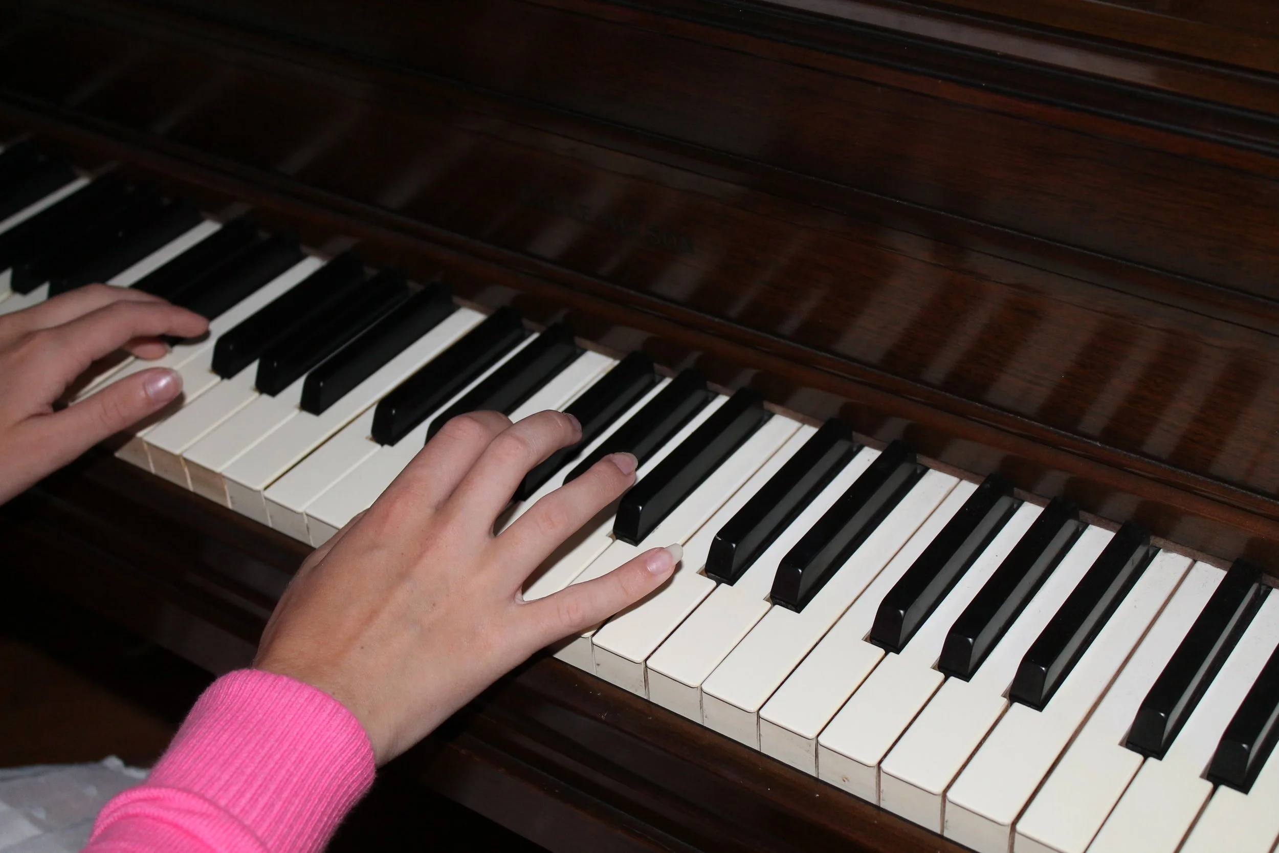 Lily's piano practice (on the broken piano), 2013