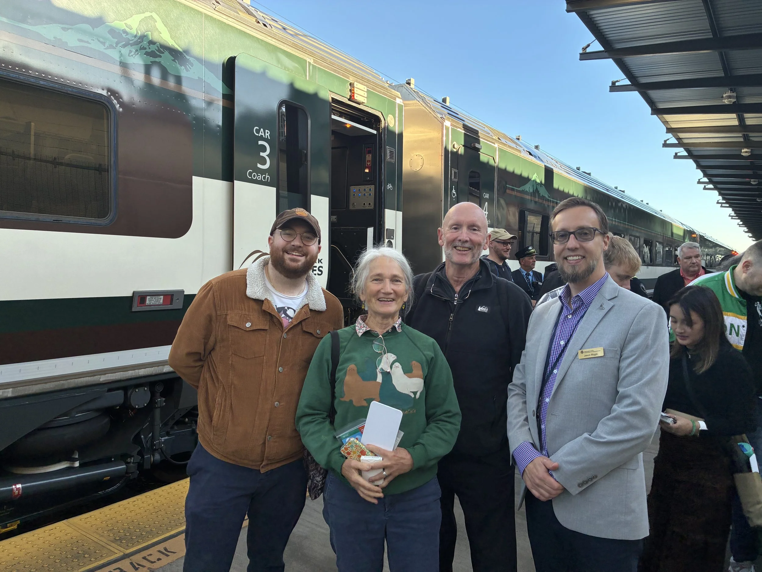 WPSR Advocates photographed in front of a new Amtrak train.