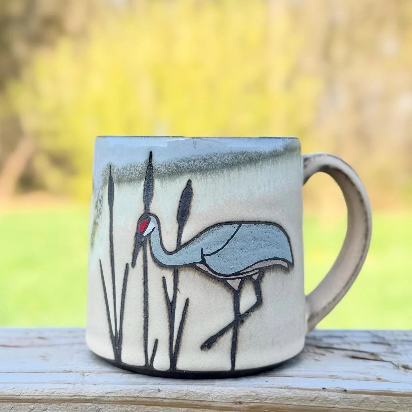 Make some room in your cupboard for our third and final new flock member, the elegant Sandhill Crane! 🌾

This piece captures the crane&rsquo;s quiet grace among the cattails, finished with that signature pop of red. It&rsquo;s the perfect companion 