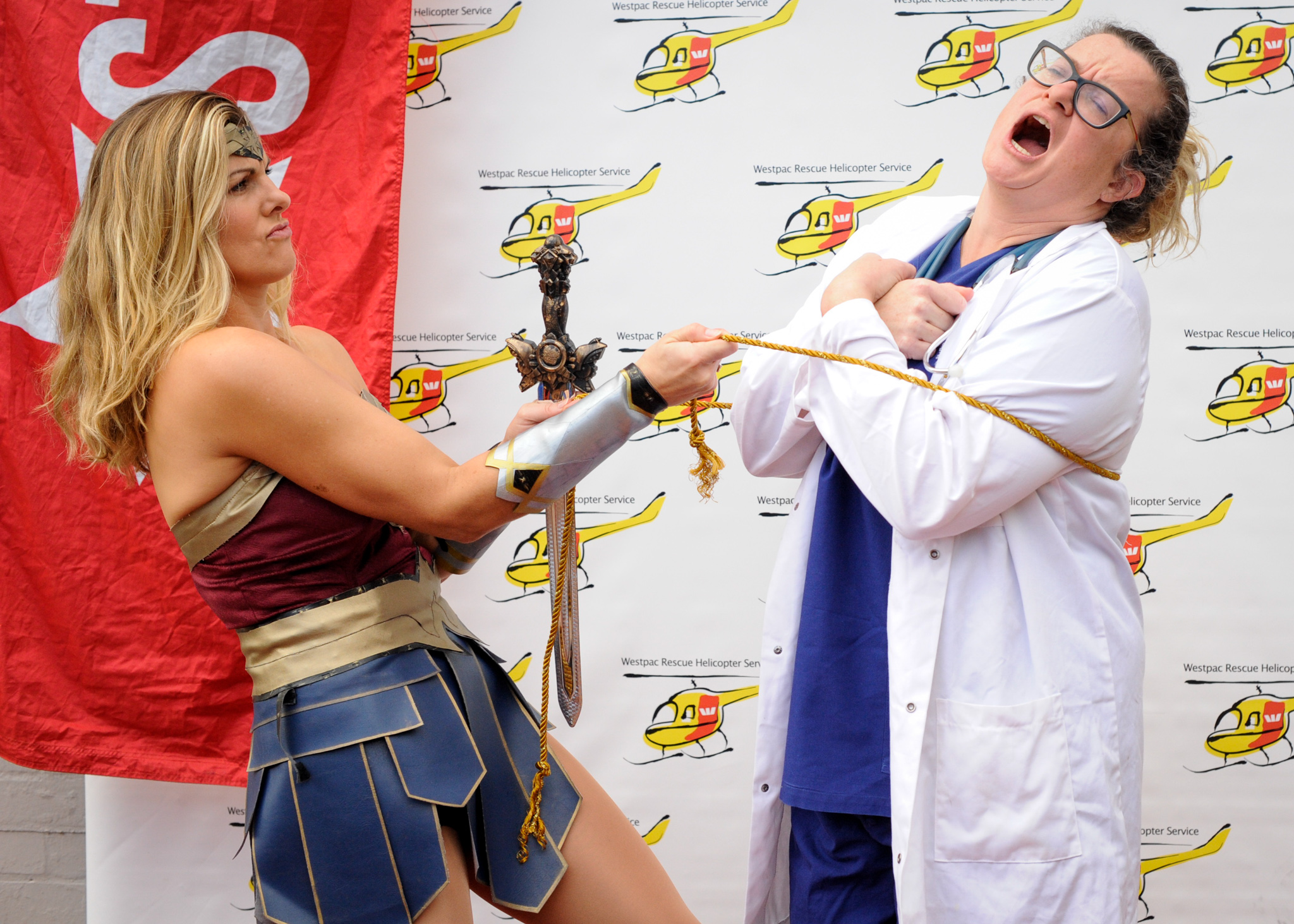 Wonder woman and the crazy doctor getting ready for the big jump