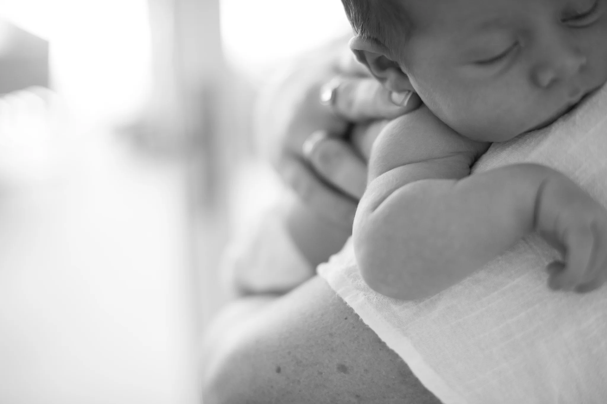 newborn baby cuddles