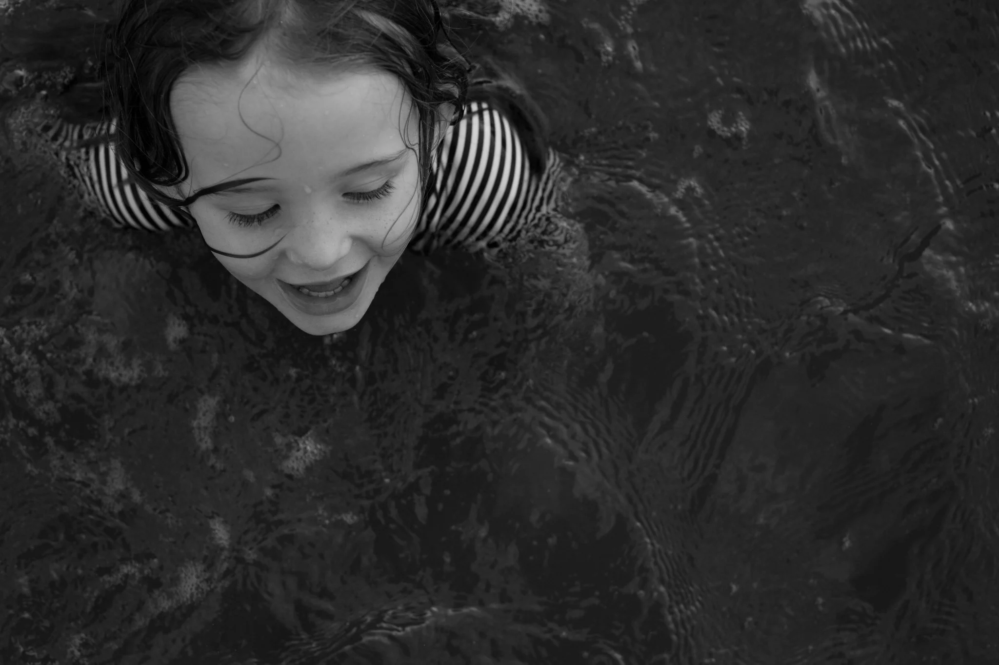 central coast family photographer swimming in the lake