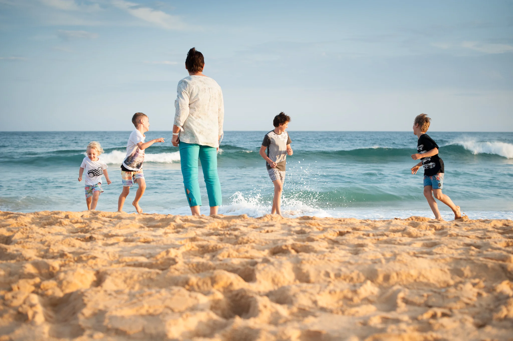 central coast family photographer running towards grandma