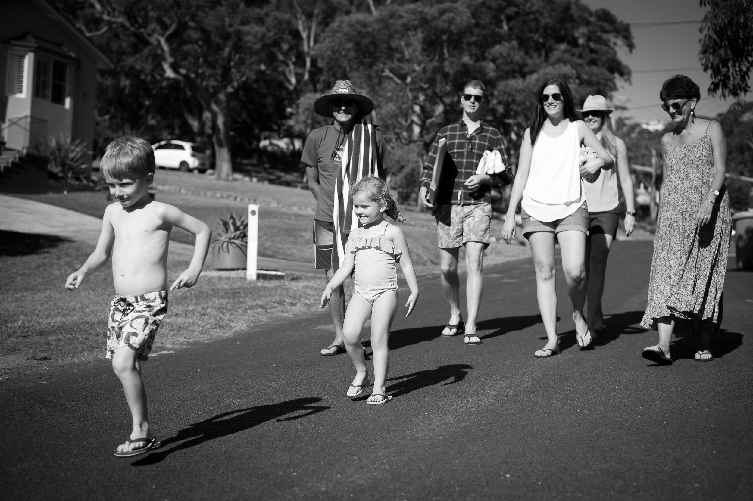 family walk to the beach copacabana nsw