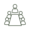 Silhouettes of people sitting around a conference table