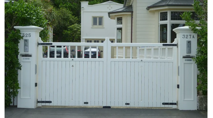 Installed Aspen timber gate showing the completed entrance design
