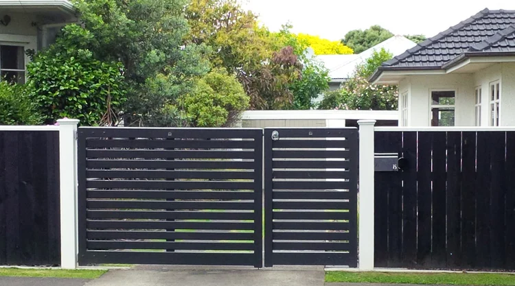 Installed Finlay timber gate showing the completed entrance design