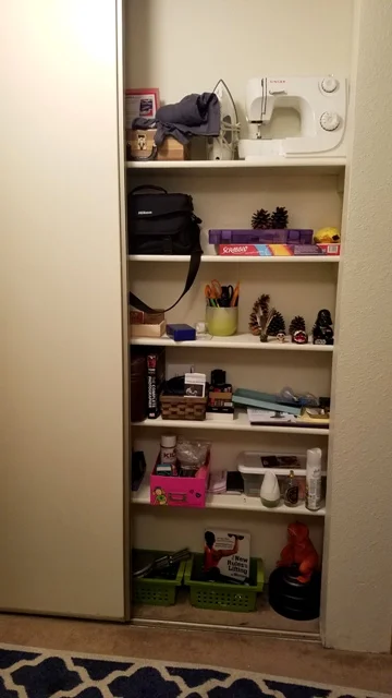 Shelving on other side of coats