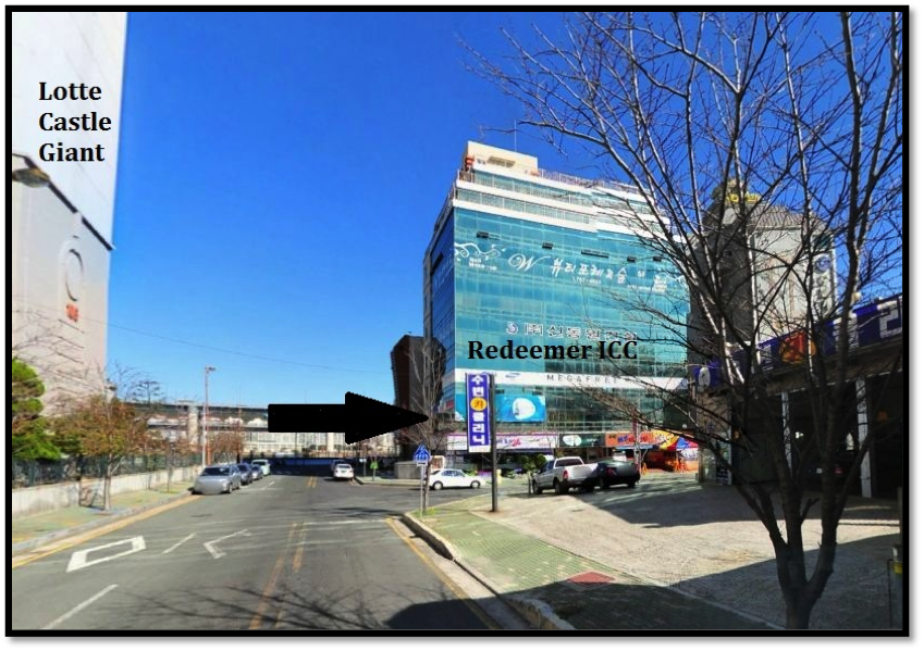 Cross the road, turn right, and walk towards the corner. Redeemer is one block down on the 3rd floor of the Sky Building. The outside says “MEGAFREE” and the building is next to Angel-in-Us Coffee Shop. The first floor has a Blueberry Convenience Store.