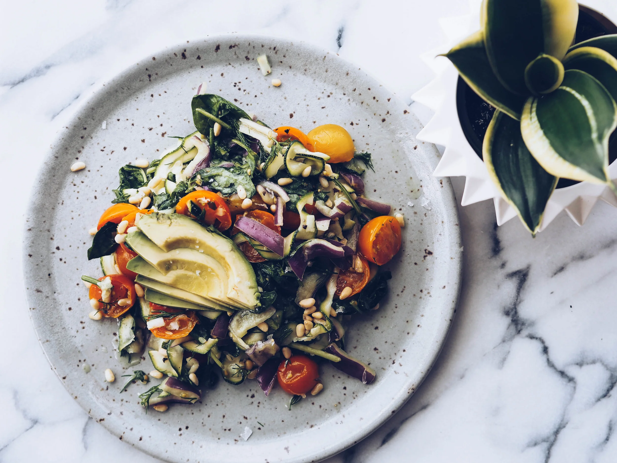 Shaved Zucchini Salad with Plant-Based Cheese and Pine Nuts