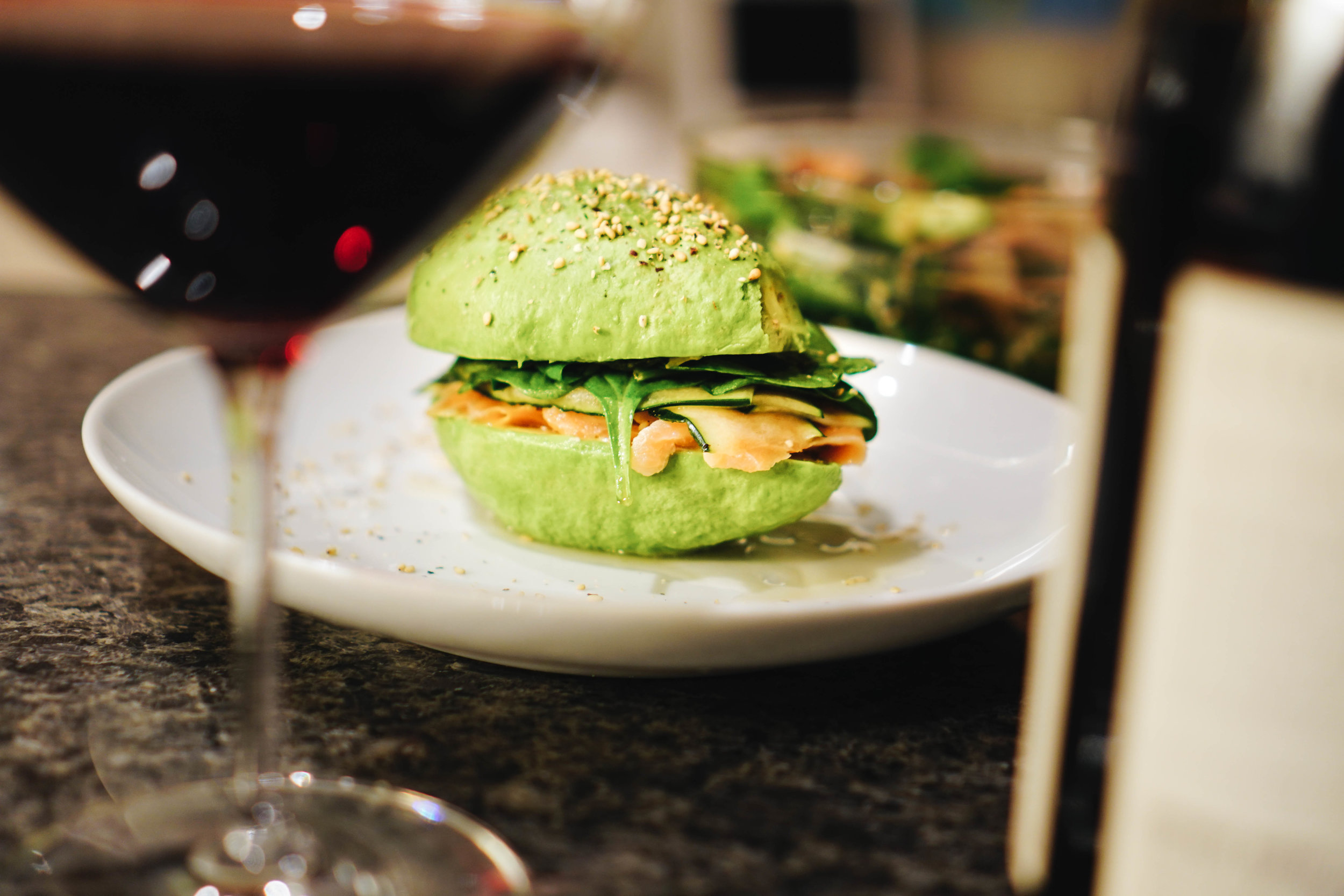 Avocado Bun Burger and Salmon Sushi Bowl Dinner image asset