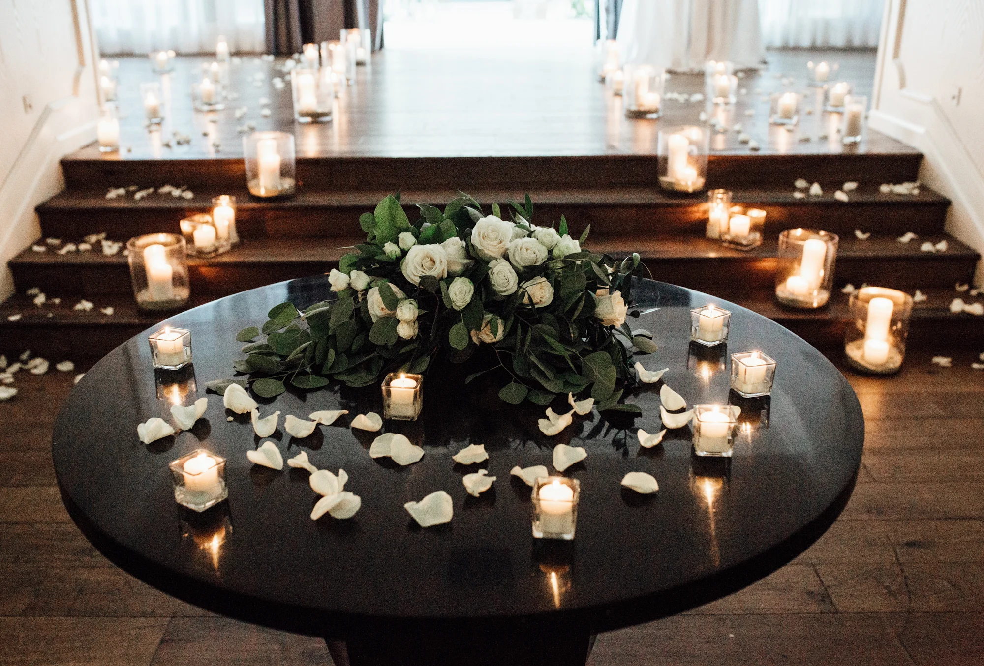 Rose petals and candles romantic rooftop marriage proposal | Wedding Proposal Planners Hotel Monaco Pittsburgh | Exhale Events