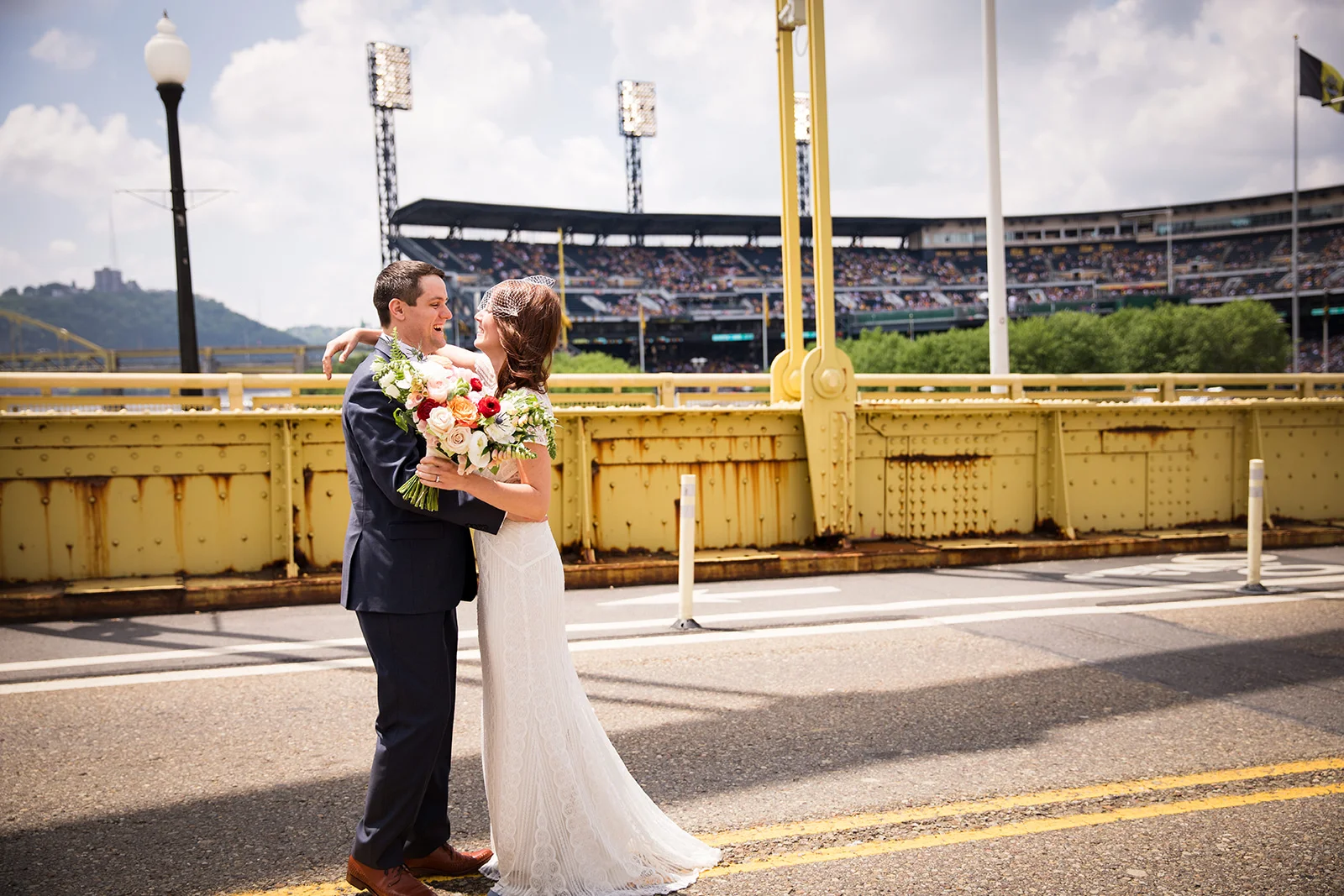 Vintage bridal gown and birdcage veil worn by bride, sharing a first look with the groom for their vintage wedding in Pittsburgh. See more fun details at exhale-events.com