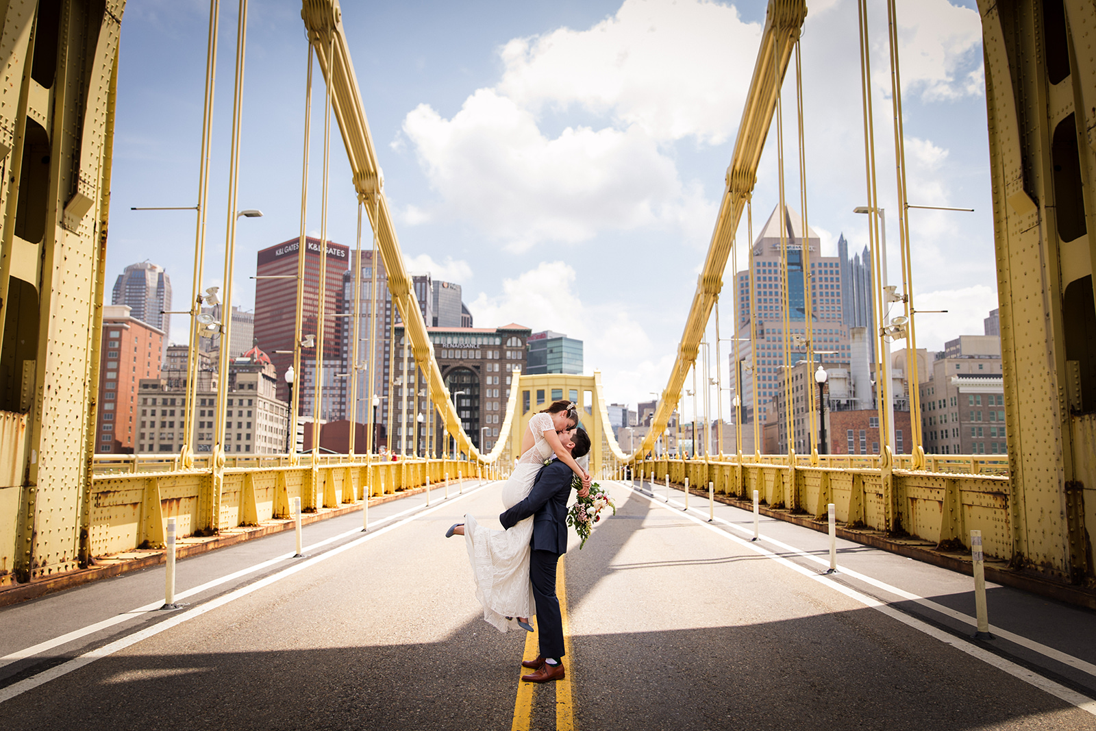 Vintage bridal gown and birdcage veil worn by bride, sharing a moment with the groom holding her wedding bouquet for their vintage wedding in Pittsburgh. See more fun details at exhale-events.com