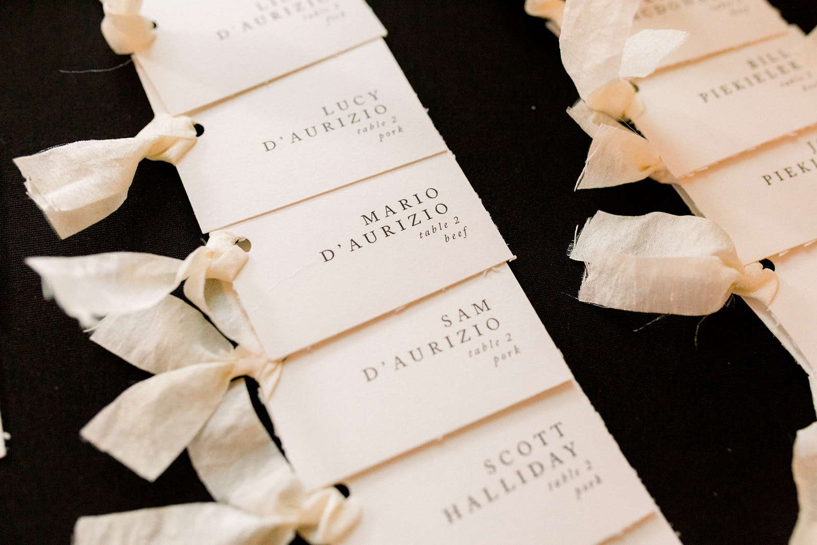 Wedding escort cards with hand-tied ribbon at wedding reception for Pittsburgh wedding held at Hotel Monaco. See more beautiful details of this simple, yet stunning wedding at exhale-events.com!