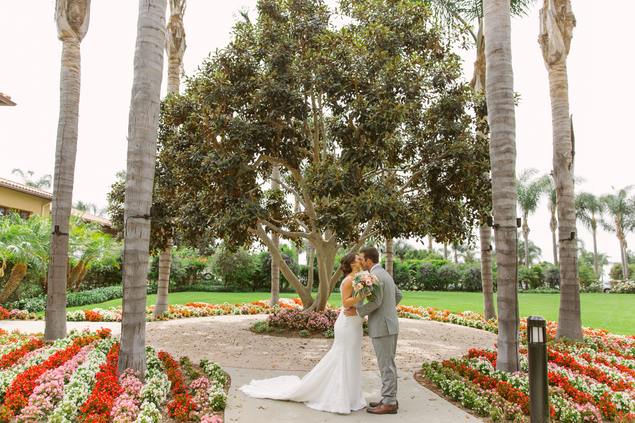 Bride and groom share a first look for San Diego, California outdoor wedding planned by Exhale Events. See all the beautiful details at exhale-events.com!