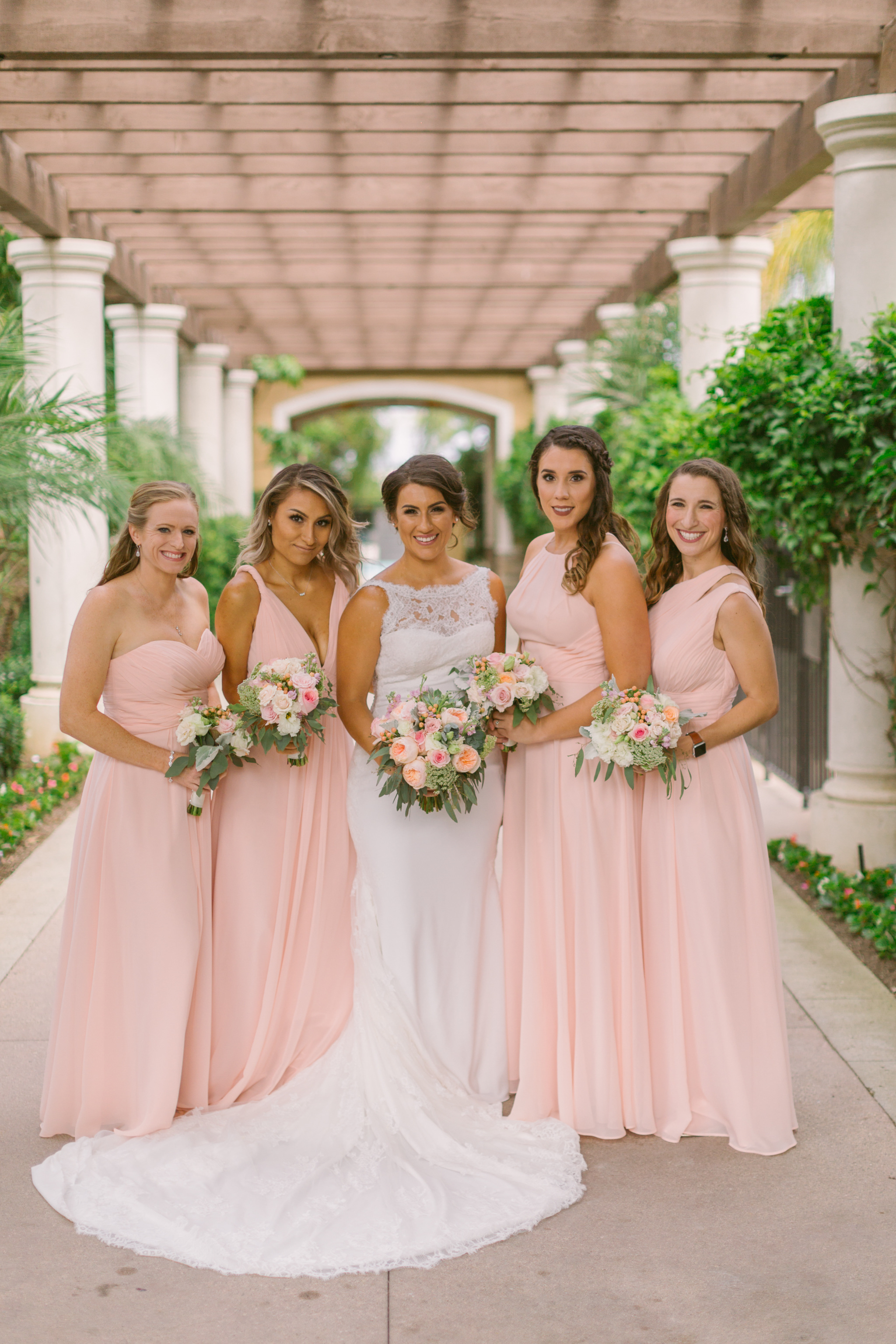 Bride and bridesmaids take wedding photos for San Diego, California outdoor wedding planned by Exhale Events. See all the beautiful details at exhale-events.com!
