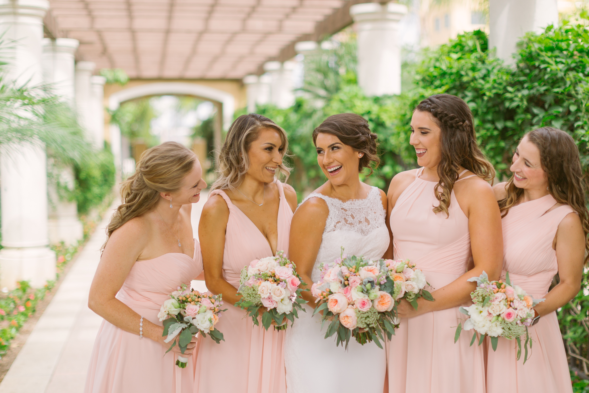 Bride and bridesmaids take wedding photos for San Diego, California outdoor wedding planned by Exhale Events. See all the beautiful details at exhale-events.com!