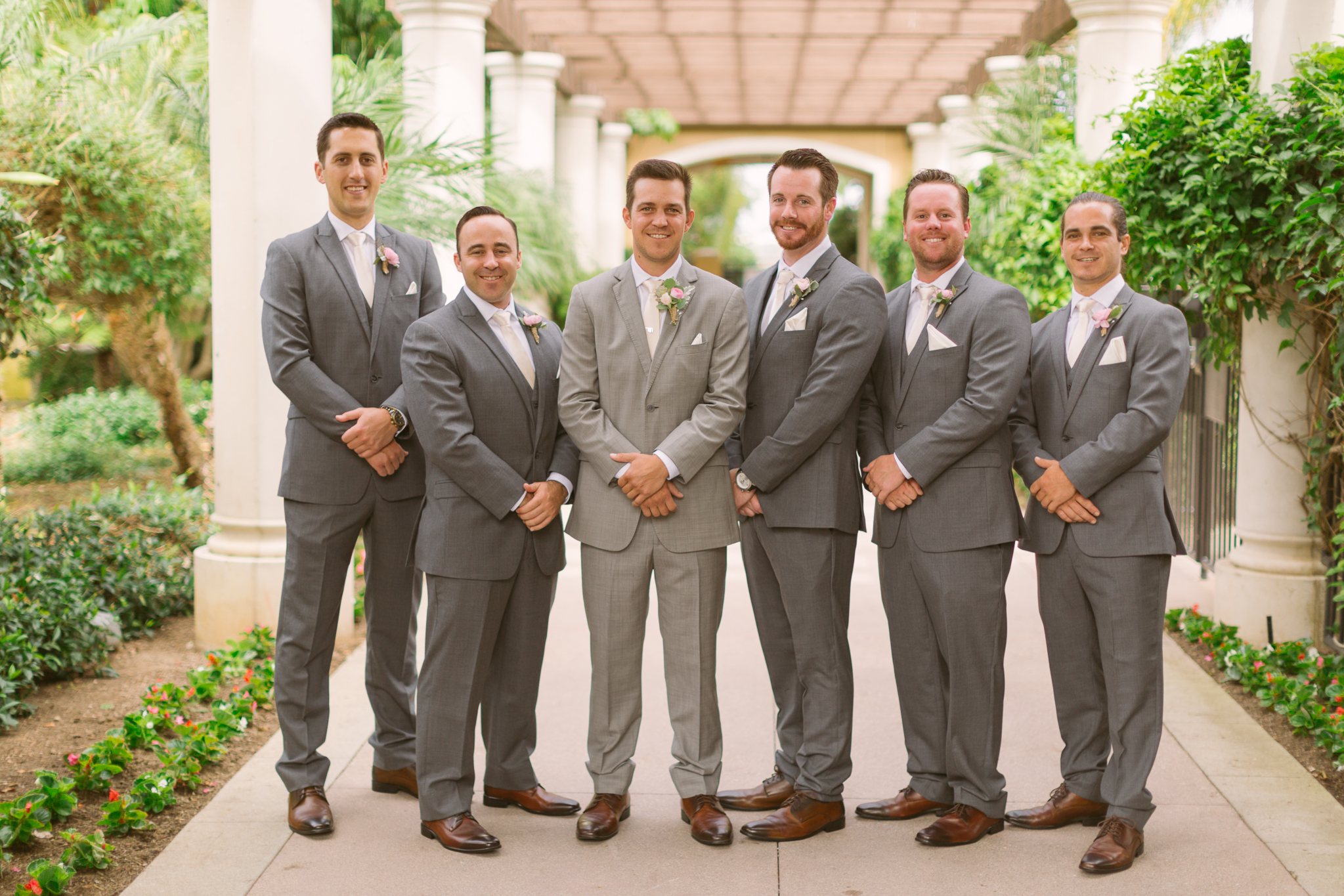 Groom and groomsmen take wedding photos for San Diego, California outdoor wedding planned by Exhale Events. See all the beautiful details at exhale-events.com!