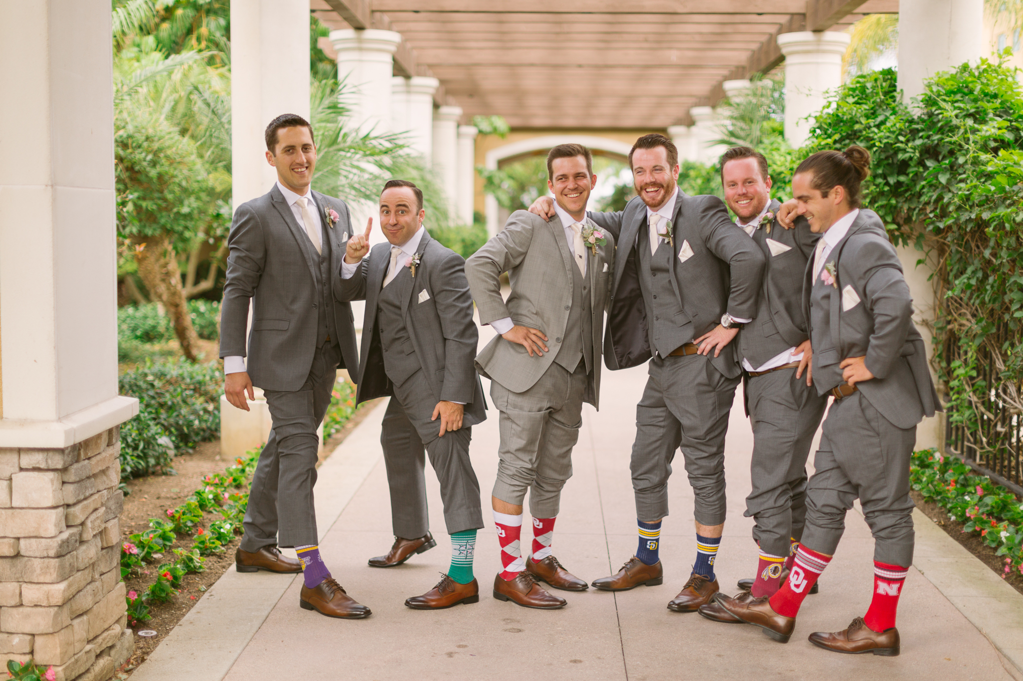 Groom and groomsmen take wedding photos for San Diego, California outdoor wedding planned by Exhale Events. See all the beautiful details at exhale-events.com!