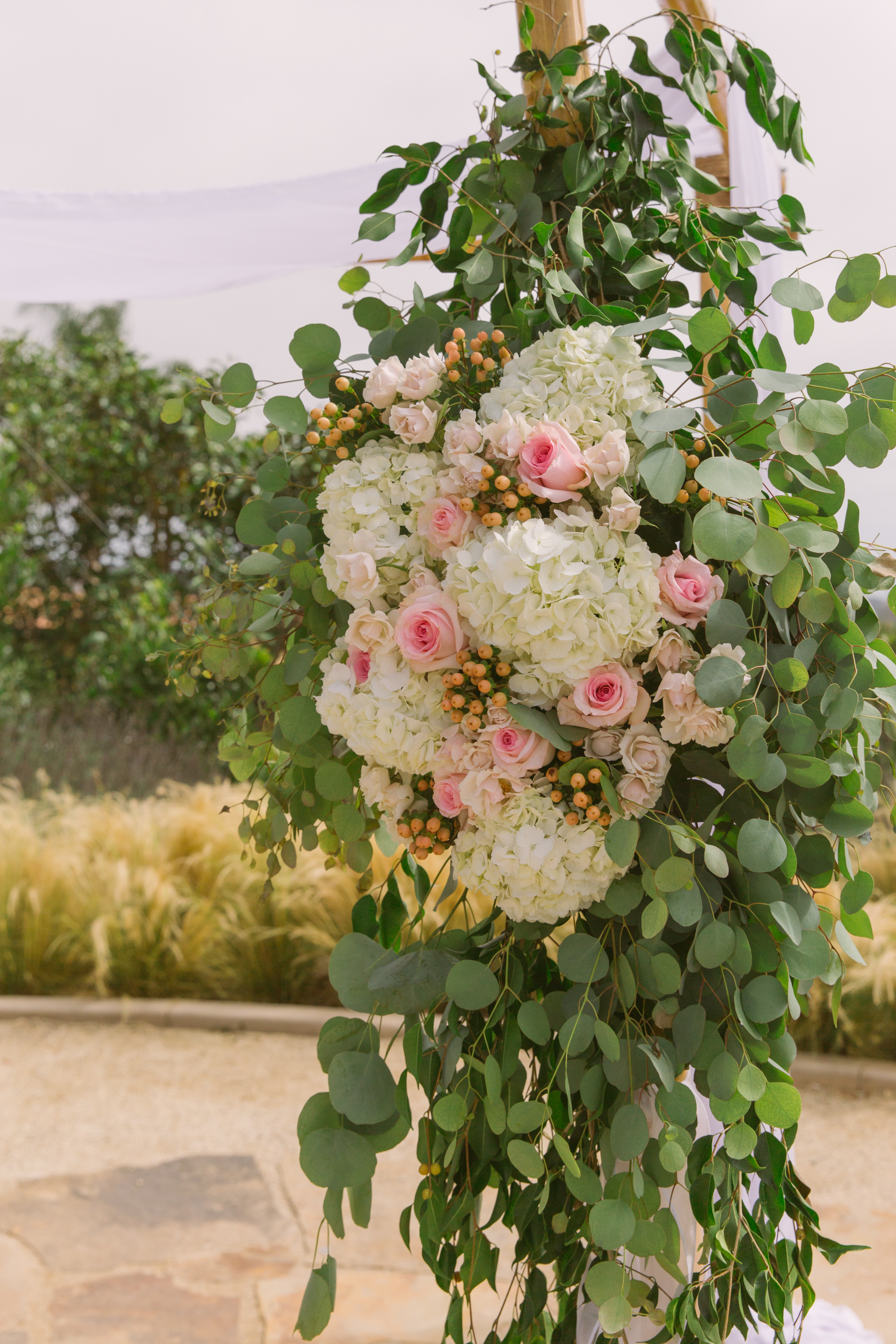 Wedding flower decor at wedding ceremony for San Diego, California outdoor wedding planned by Exhale Events. See all the beautiful details at exhale-events.com!