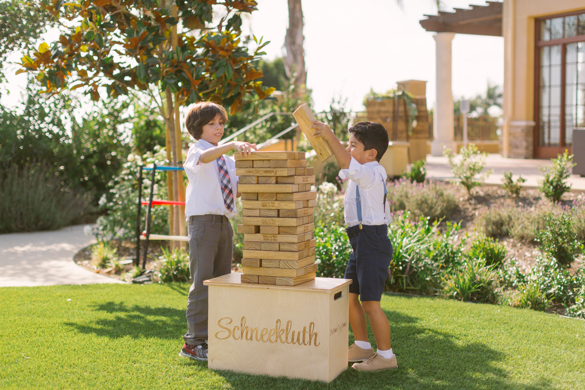 Customized Jenga game to entertain guests at San Diego, California outdoor wedding planned by Exhale Events. See all the beautiful details at exhale-events.com!