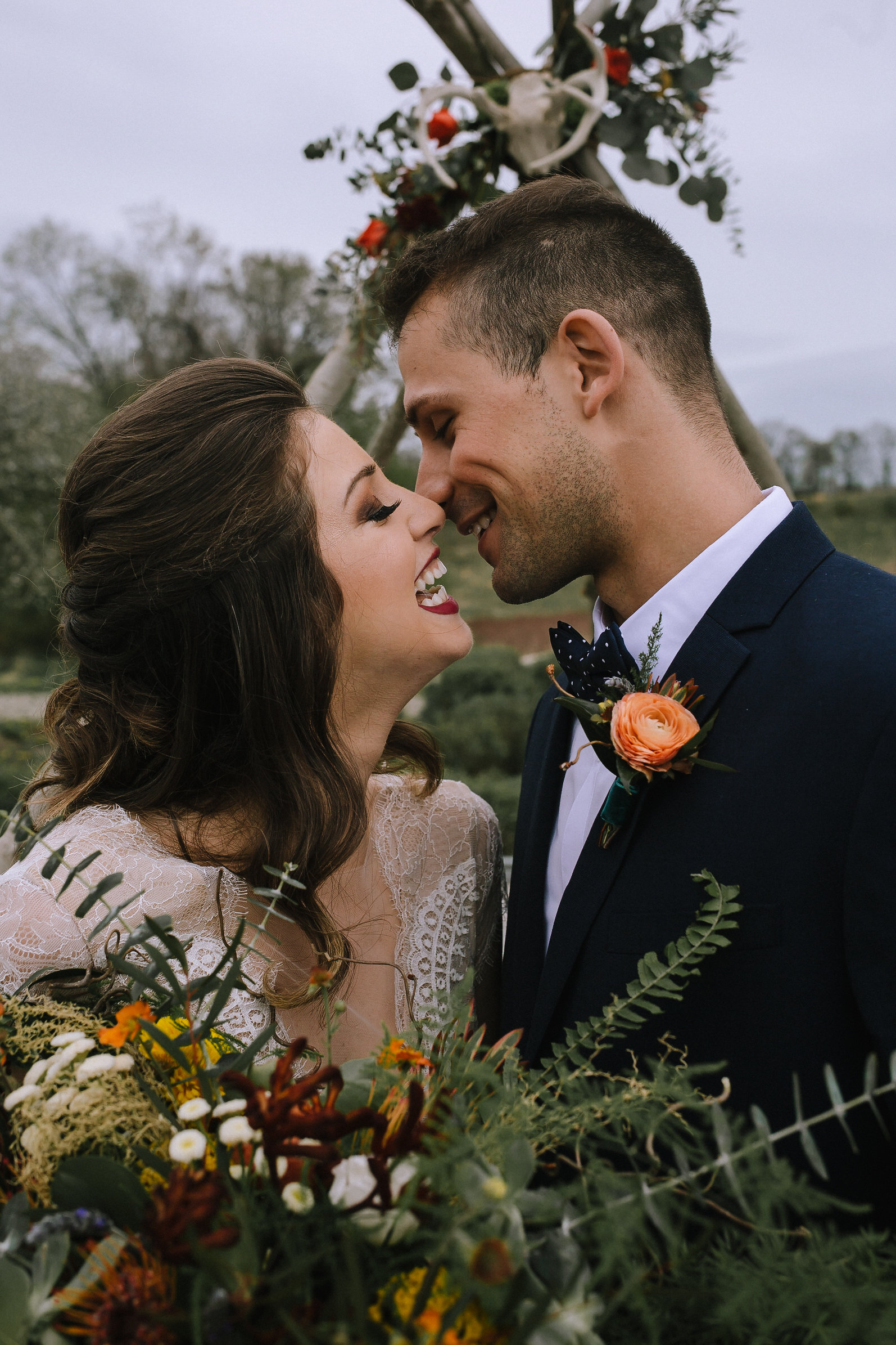 Boho wedding ceremony decor for fall vintage boho styled shoot designed by exhale events. Get inspired by these gorgeous wedding details at exhale-events.com!