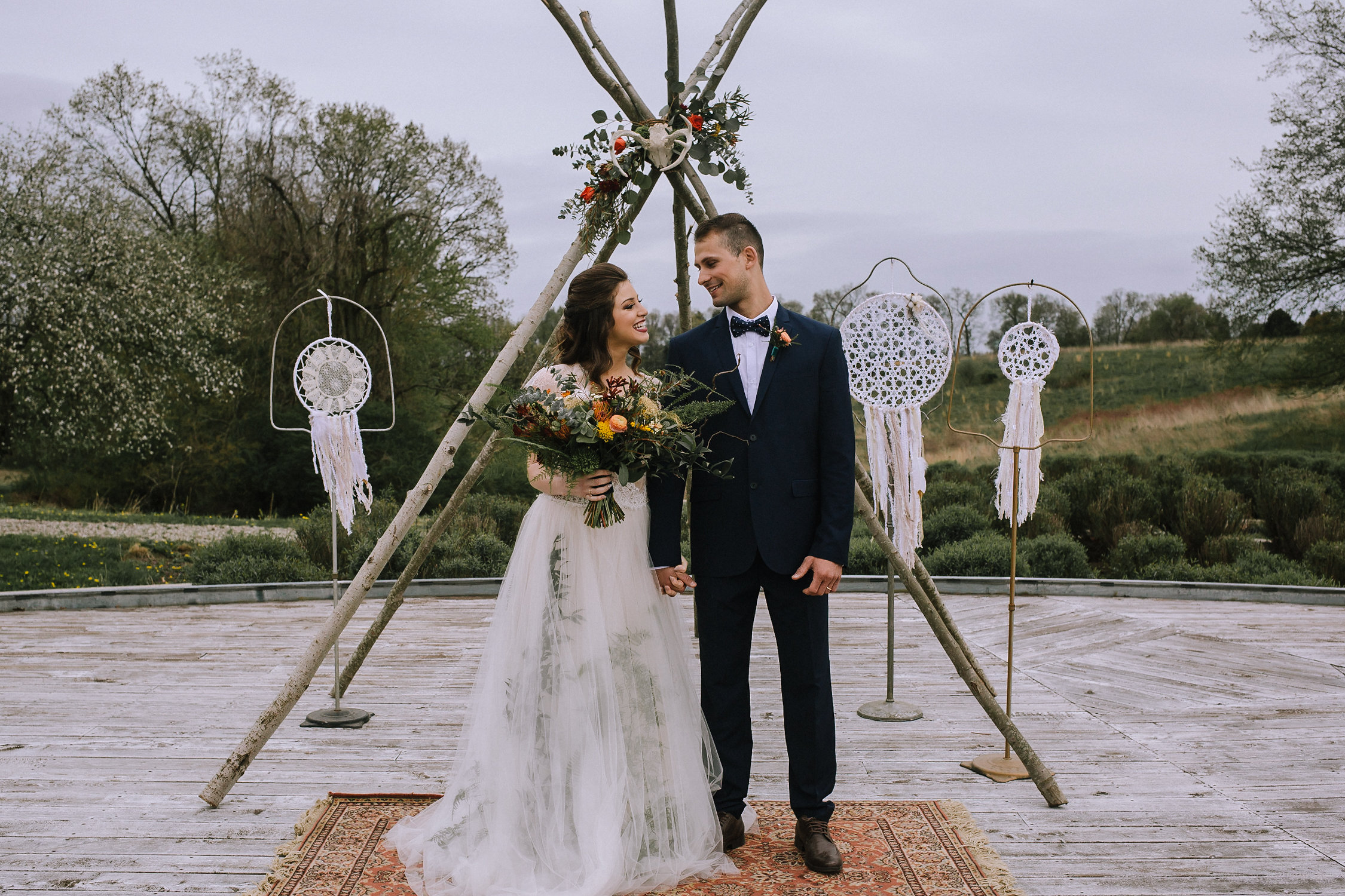 Boho wedding ceremony decor for fall vintage boho styled shoot designed by exhale events. Get inspired by these gorgeous wedding details at exhale-events.com!