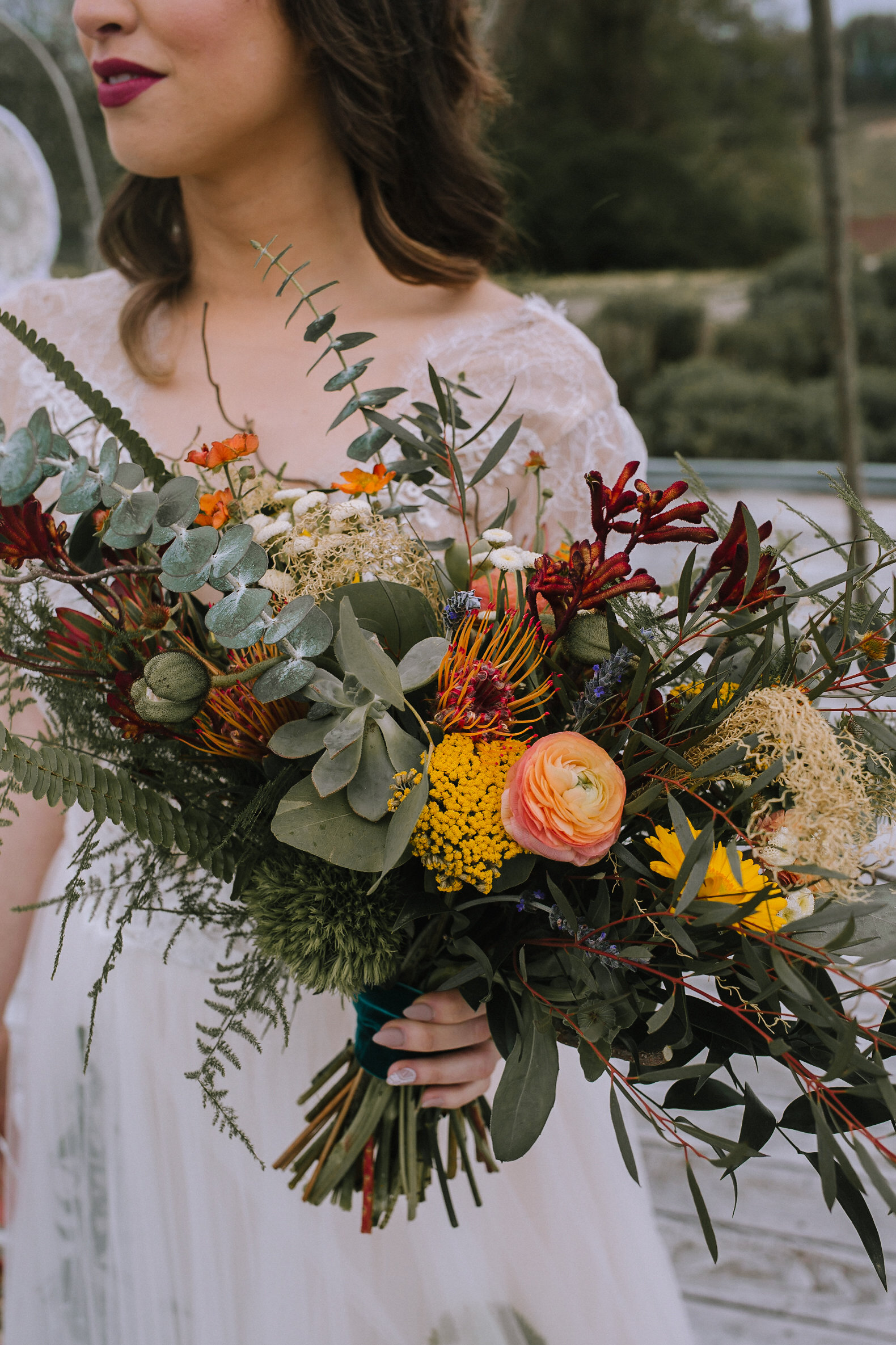 Boho bride with wedding bouquet for fall vintage boho styled shoot designed by exhale events. Get inspired by these gorgeous wedding details at exhale-events.com!