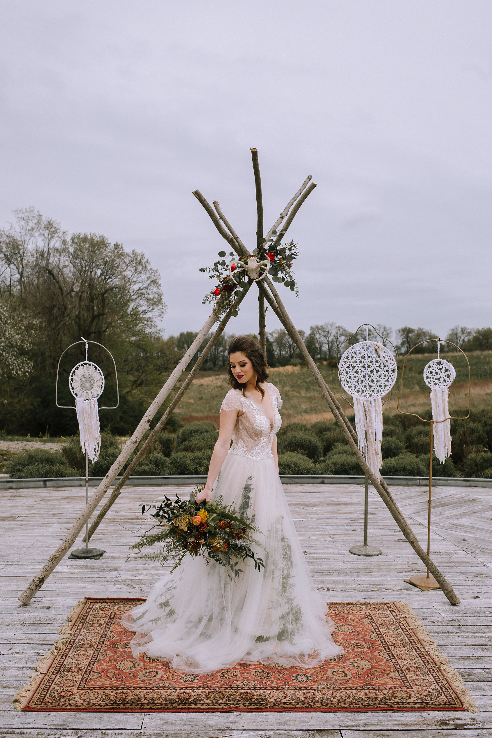 Boho bride with wedding bouquet for fall vintage boho styled shoot designed by exhale events. Get inspired by these gorgeous wedding details at exhale-events.com!