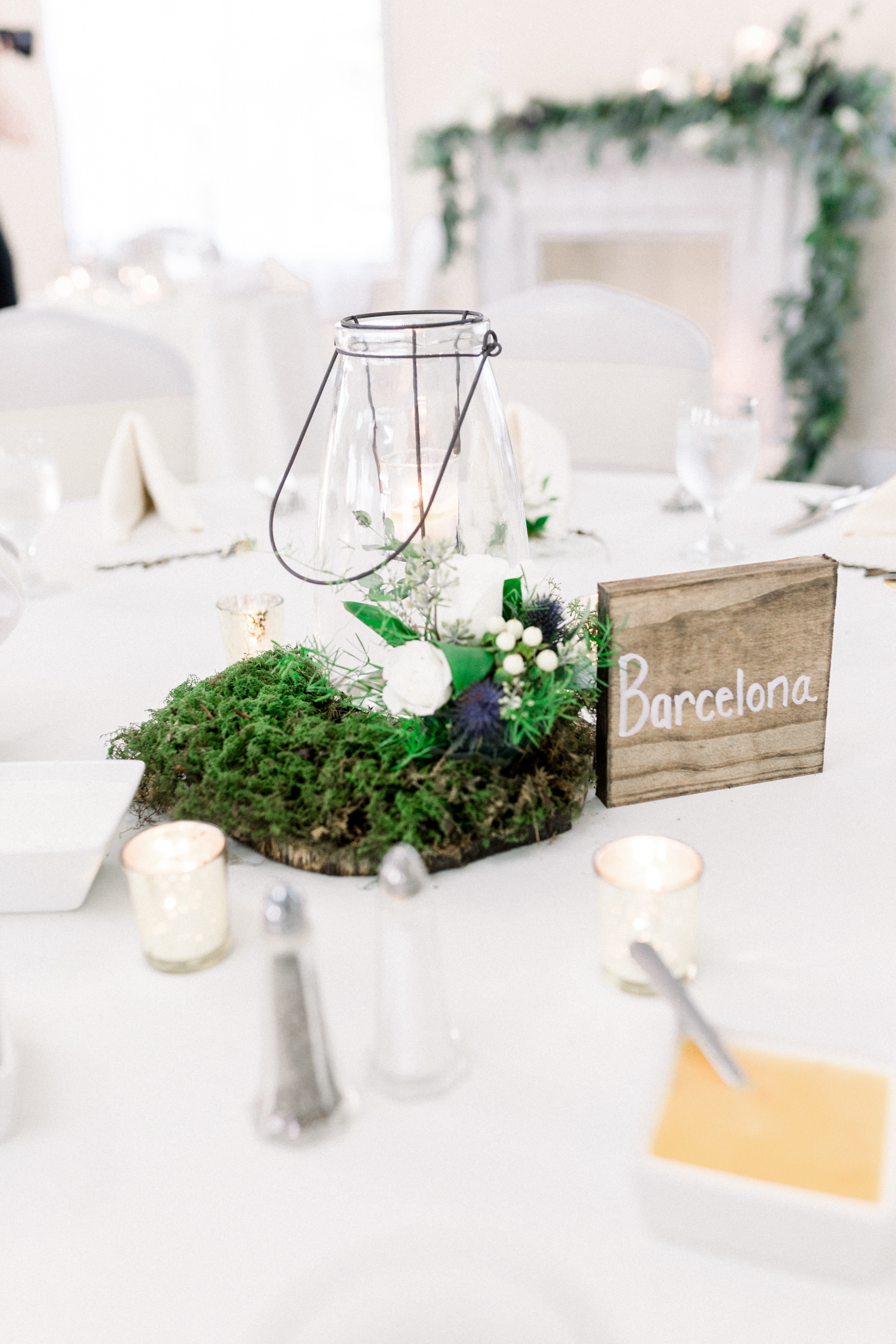 Lantern wedding centerpieces with gold and wooden accents for Pittsburgh wedding planned by Exhale Events. Find more wedding inspiration at exhale-events.com!