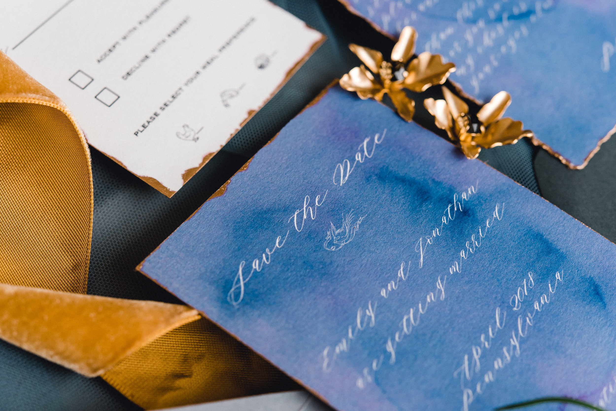 Blue wedding invitations with gold leafing for Pablo Neruda enchanting garden styled shoot planned by Exhale Events. Get inspired at exhale-events.com!