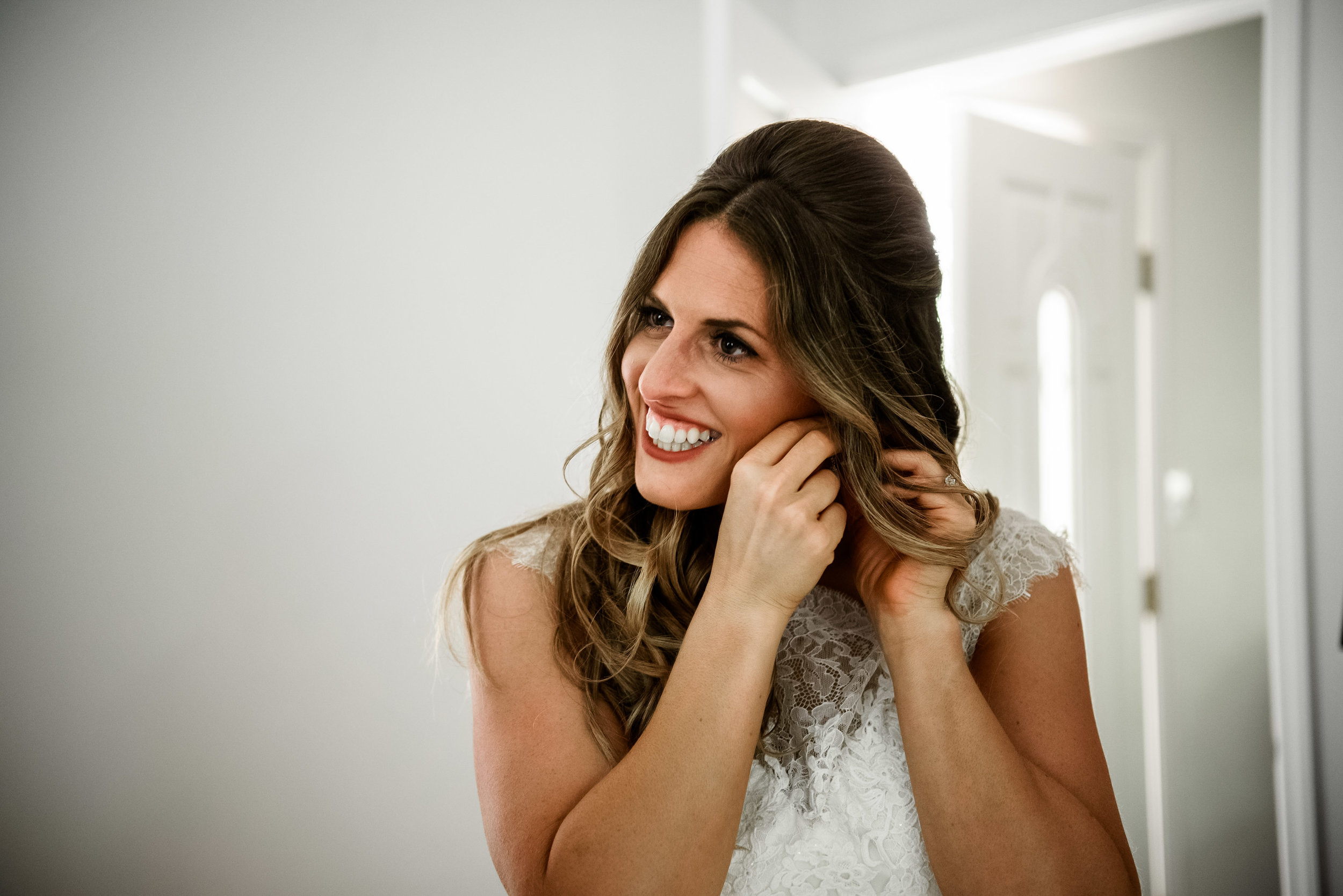 Bride getting ready for Pittsburgh wedding planned by Exhale Events. Find more inspiration at exhale-events.com!