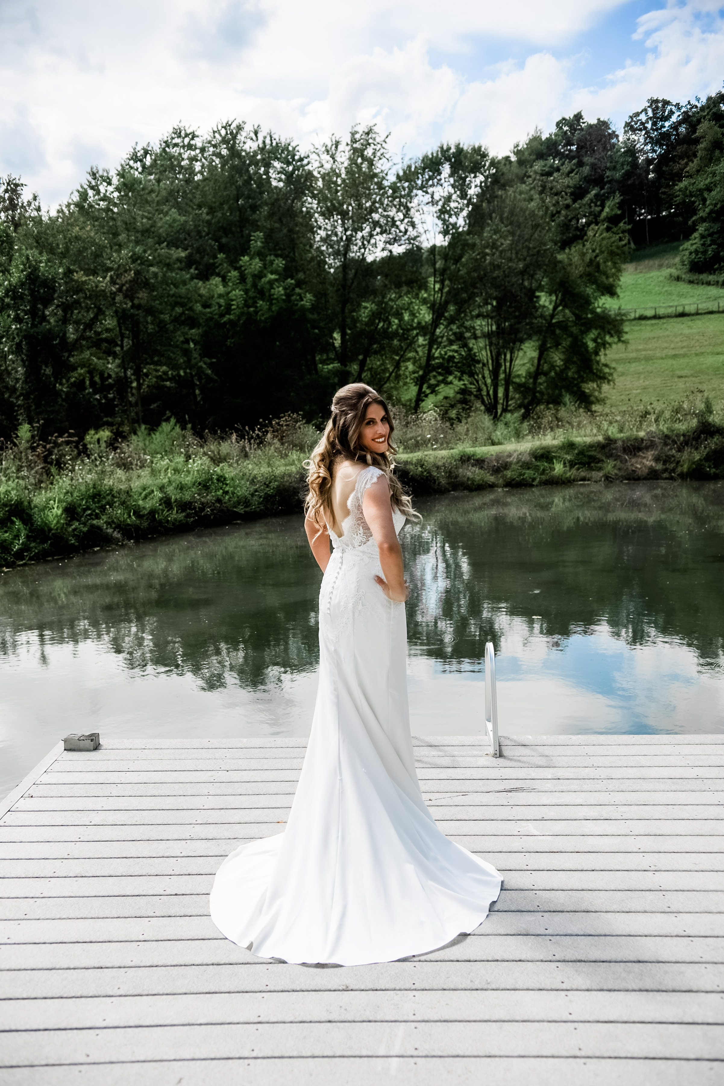 Bride poses for wedding photos in wedding dress for Pittsburgh wedding planned by Exhale Events. Find more inspiration at exhale-events.com!