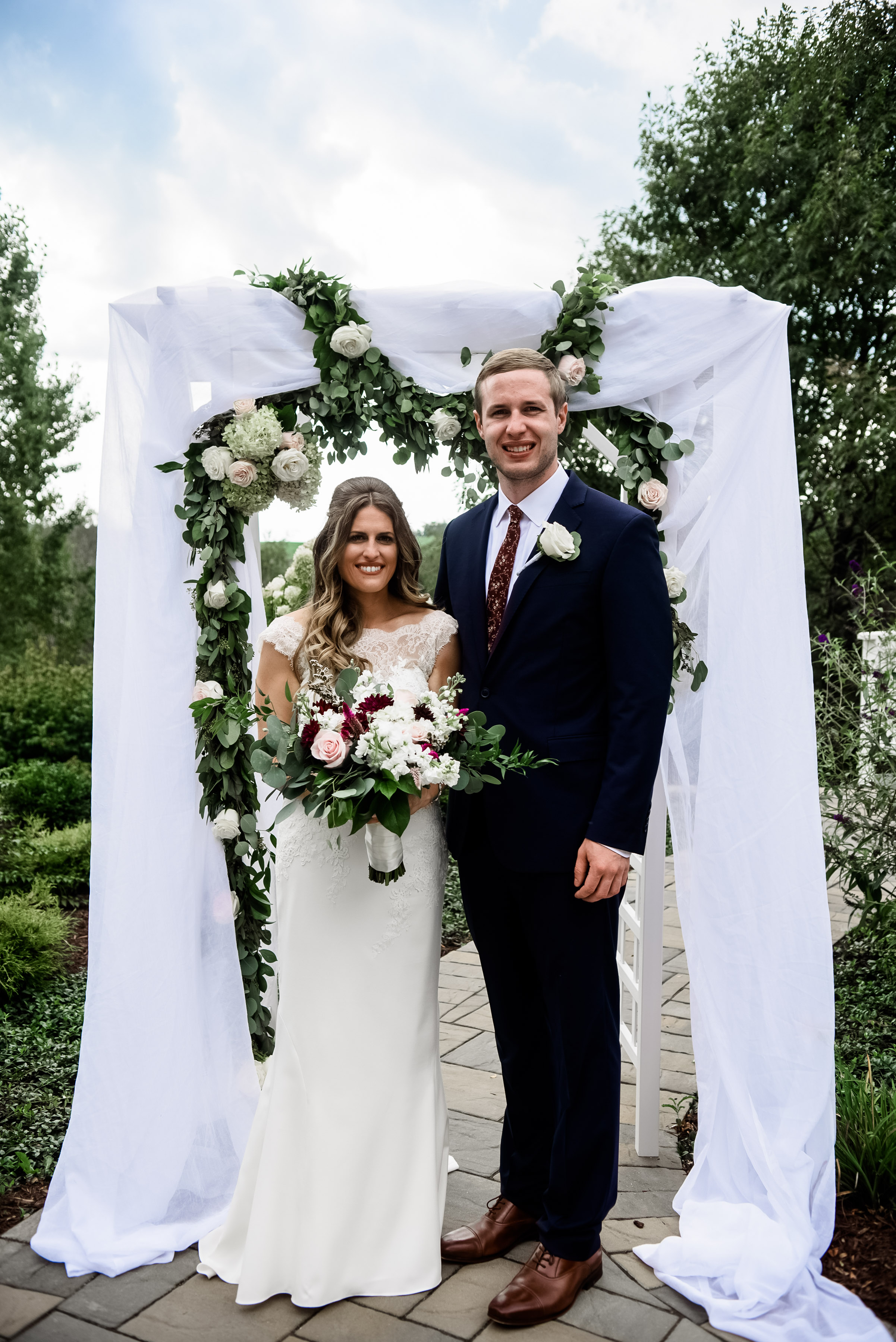 Bride and groom pose for outdoor wedding photos with family at Pittsburgh wedding planned by Exhale Events. Find more wedding inspiration at exhale-events.com!