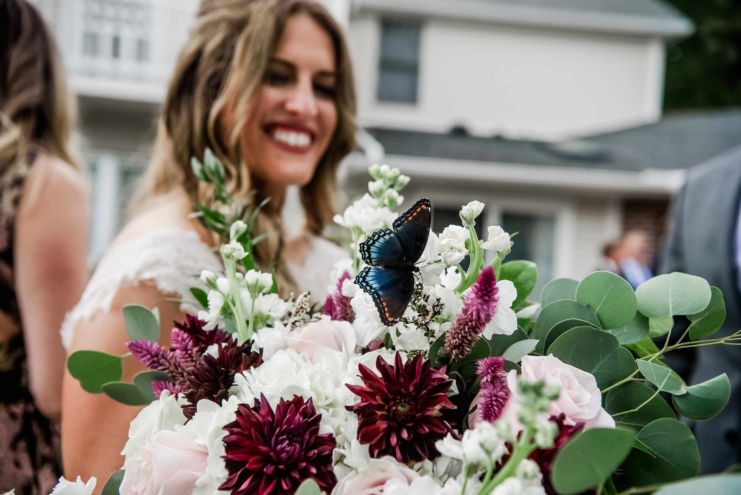 Bride with burgundy wedding bouquet at Pittsburgh wedding planned by Exhale Events. Find more wedding inspiration at exhale-events.com!