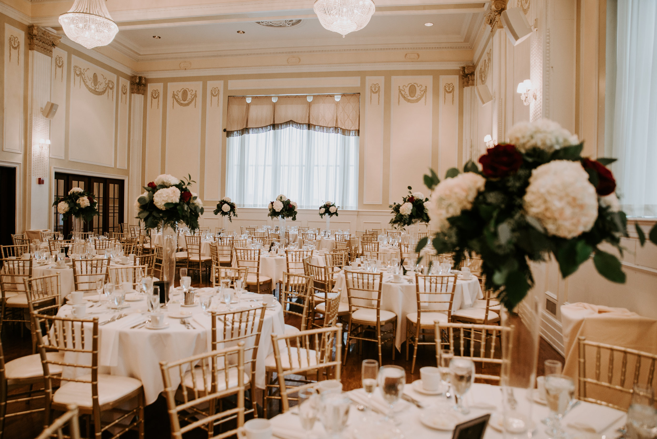 Wedding reception design with gold wedding accents for Buffalo, NY wedding planned by Exhale Events. Find more wedding inspiration at exhale-events.com!