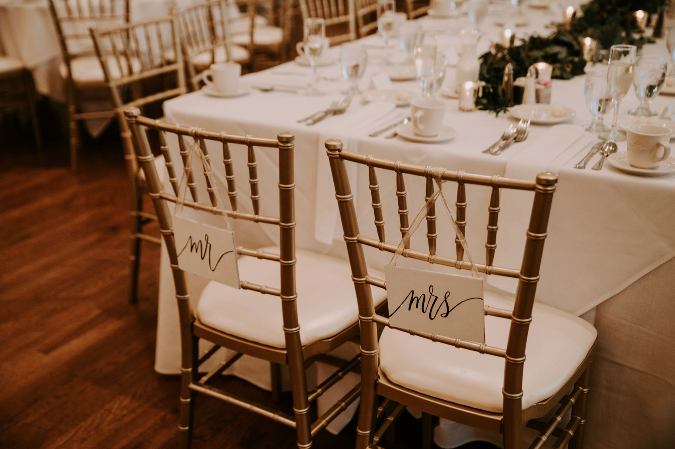 Wedding chair signs at Buffalo, NY wedding planned by Exhale Events. Find more wedding inspiration at exhale-events.com!