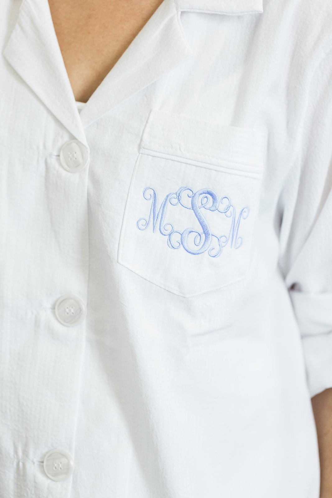 Bride's monogrammed shirt as she gets ready for Pittsburgh wedding at PNC Park planned by Exhale Events. Find more wedding inspiration at exhale-events.com!