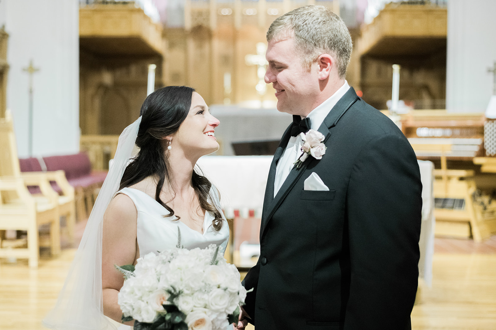Bride and groom pose for wedding photos after wedding ceremony for Pittsburgh wedding at PNC Park planned by Exhale Events. Find more wedding inspiration at exhale-events.com!