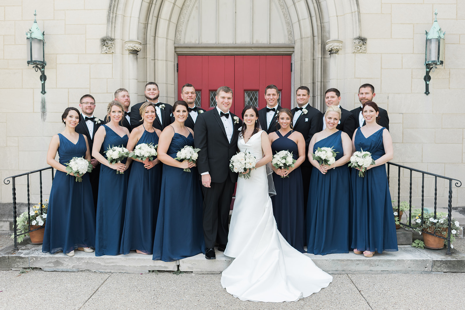Wedding party poses for wedding photos for Pittsburgh wedding at PNC Park planned by Exhale Events. Find more wedding inspiration at exhale-events.com!
