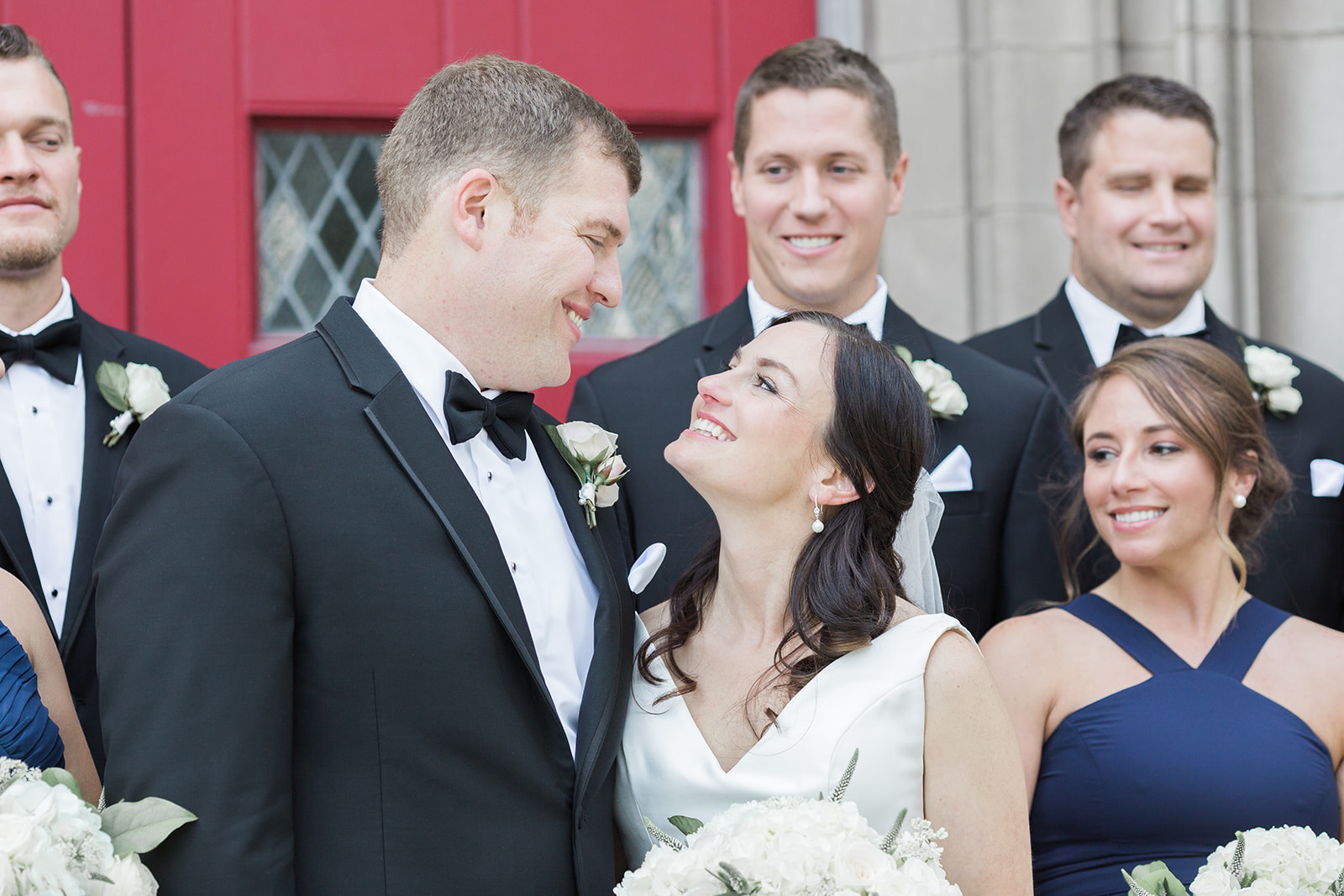 Wedding party poses for wedding photos for Pittsburgh wedding at PNC Park planned by Exhale Events. Find more wedding inspiration at exhale-events.com!