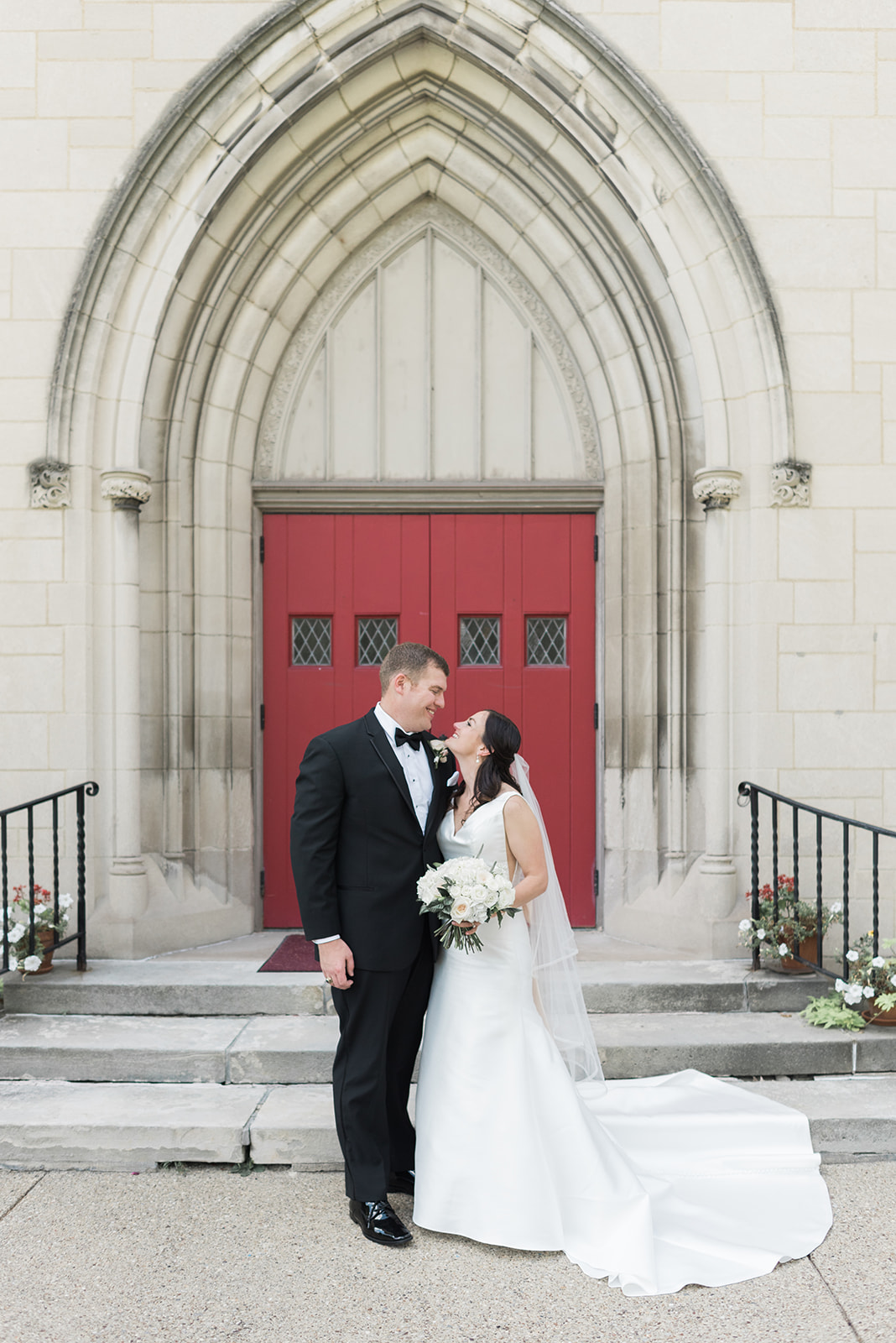 Bride and groom pose for wedding photos for Pittsburgh wedding at PNC Park planned by Exhale Events. Find more wedding inspiration at exhale-events.com!