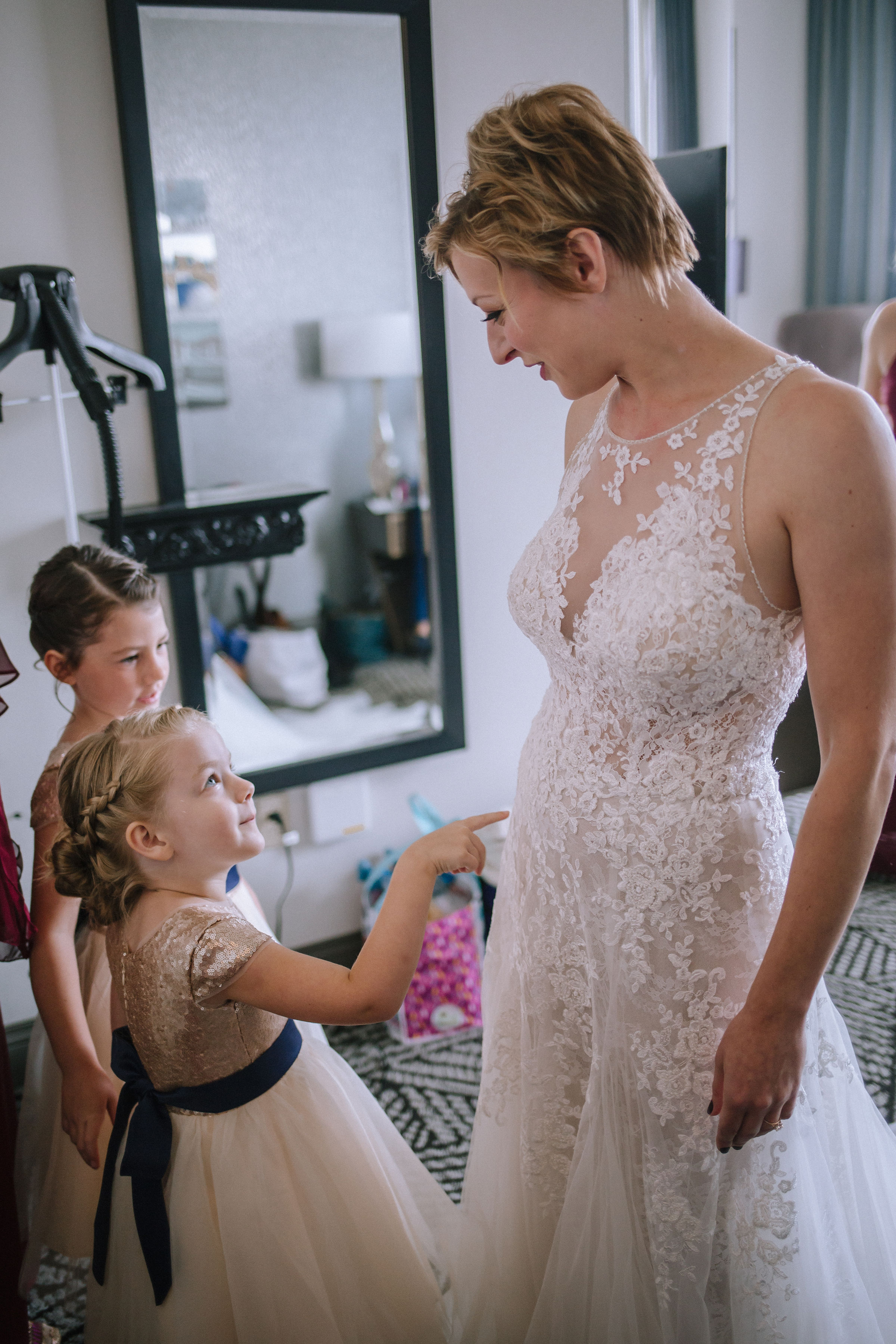 Bride getting ready with flower girls for Pittsburgh wedding at Studio Slate planned by Exhale Events. Find more wedding inspiration at exhale-events.com!