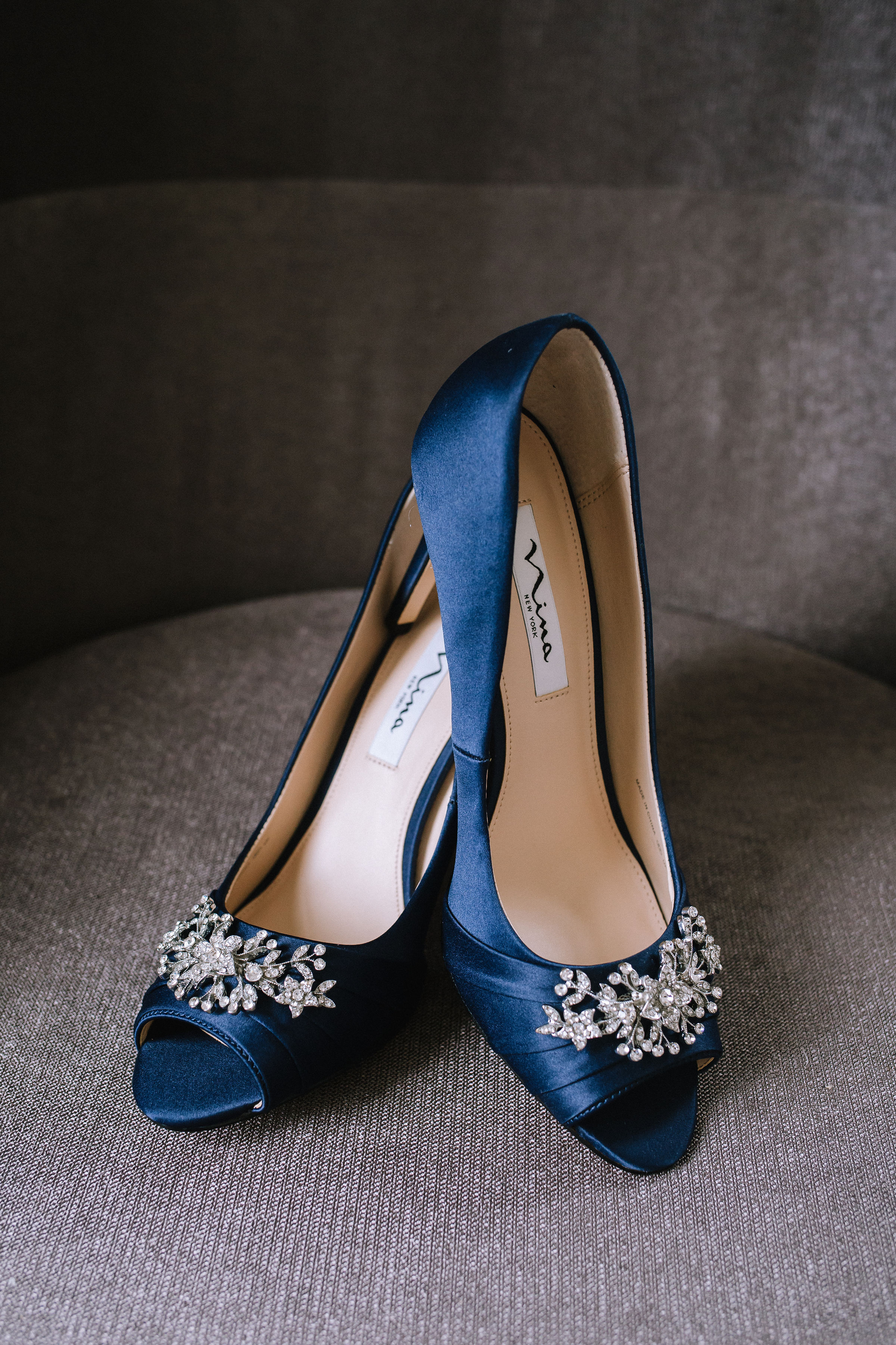 Bride's blue embellished Badgley Mischka wedding shoes for Pittsburgh wedding at Studio Slate planned by Exhale Events. Find more wedding inspiration at exhale-events.com!