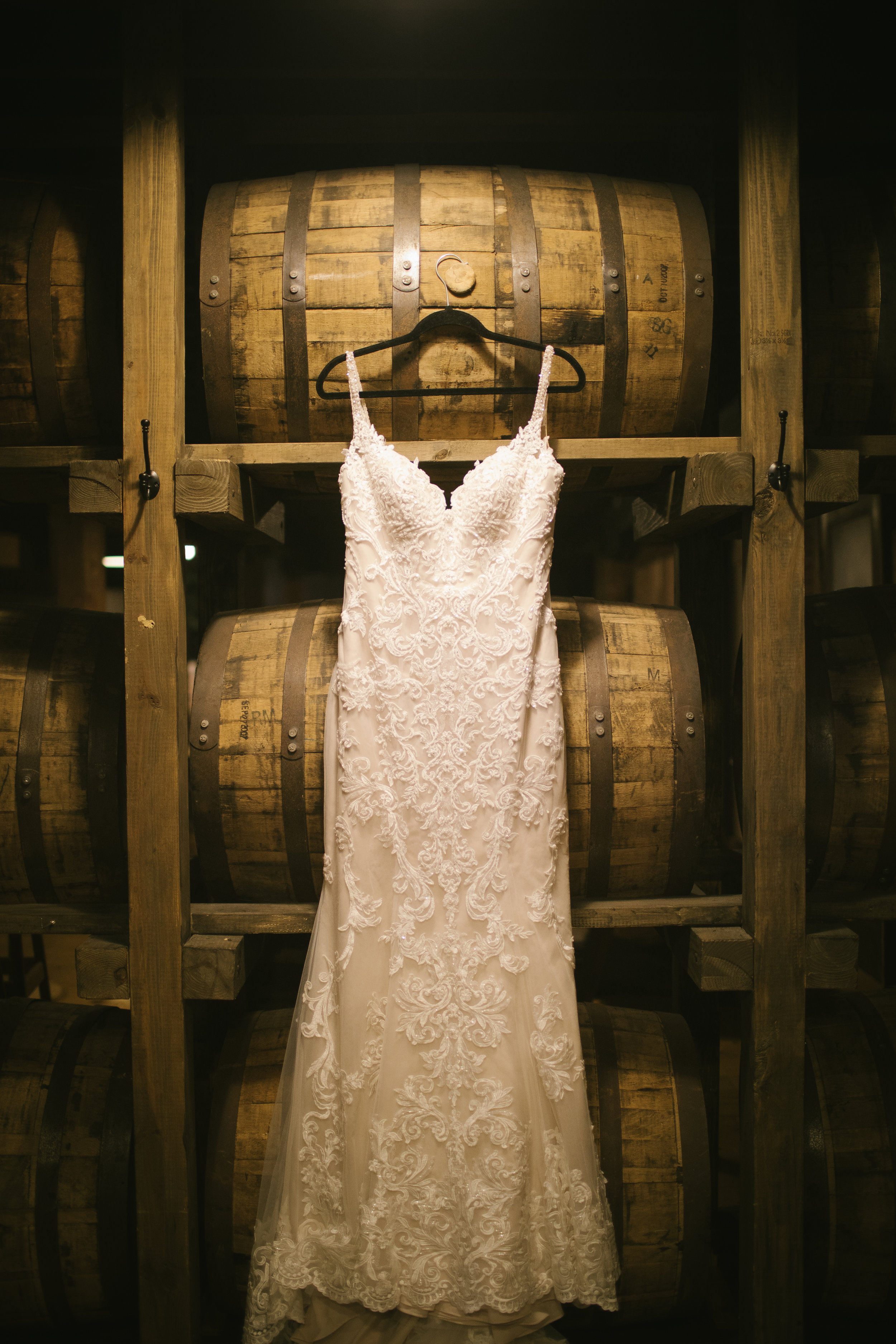Bride's lace wedding dress for rustic wedding in Pittsburgh, PA planned by Exhale Events. Find more wedding inspiration at exhale-events.com!